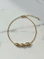 پابند زنانه صدفی طلایی | طرح صدف کوری فلزی (مینیمال)