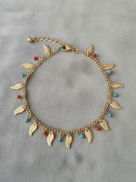 پابند زنانه طرح برگ طلایی | با مهره‌های رنگی بوهو